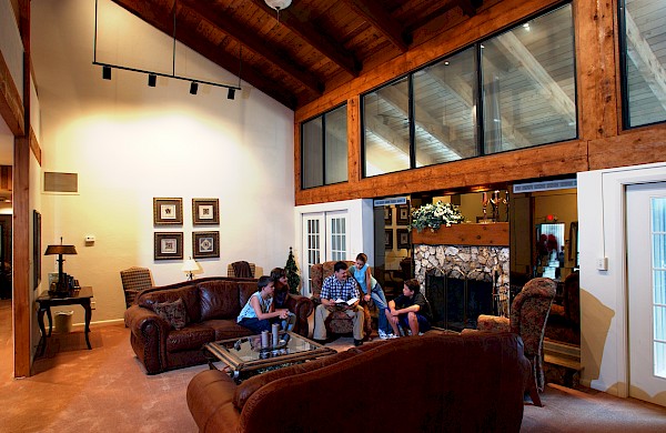 Family Reading in Great Room at Stillwaters Lodge Retreat and Conference Center, FL 