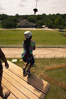 Girl leaping off the Tower of Faith, Camp Kulaqua Retreat & Conference Center, FL